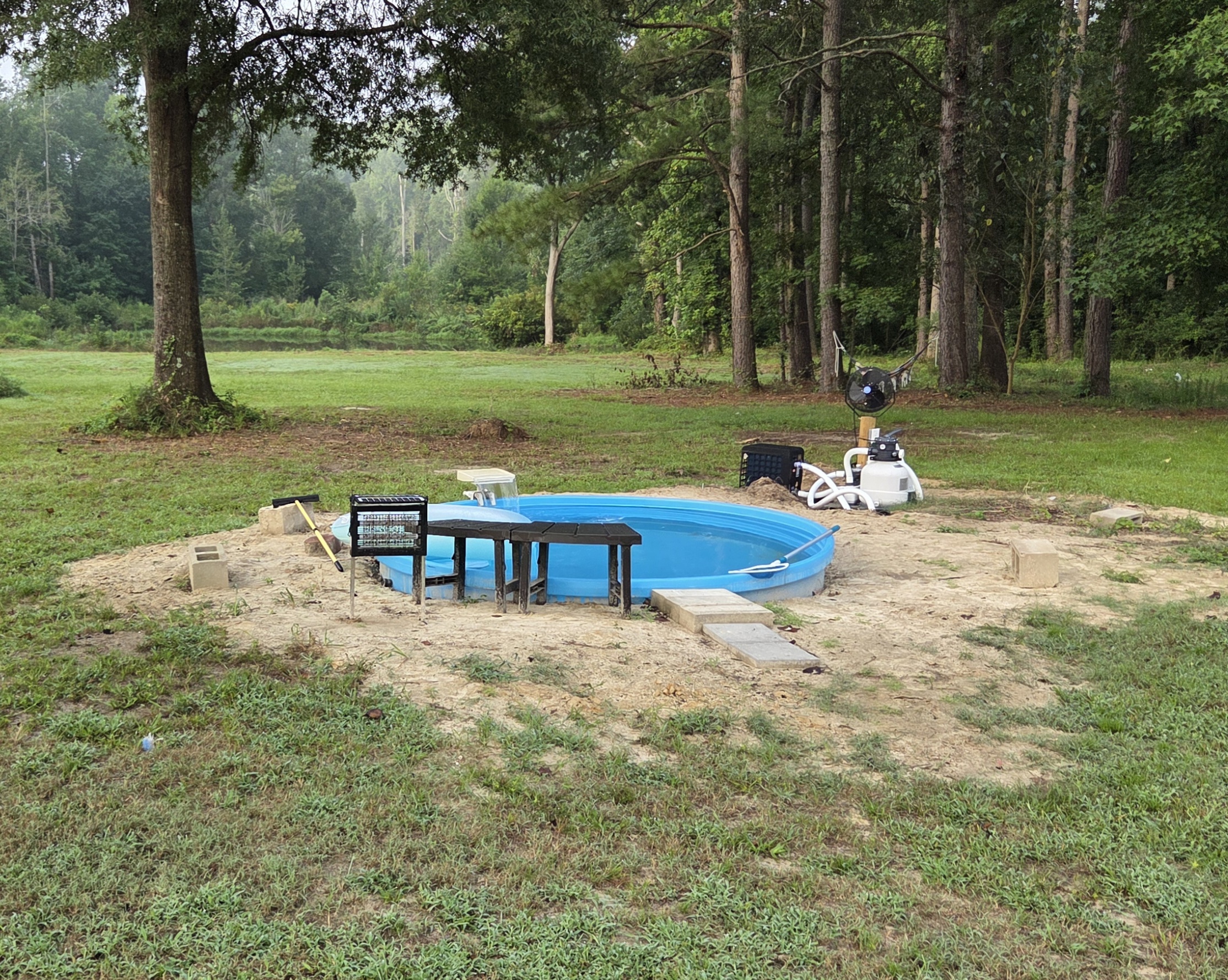 We Turned Our Stock Tank Into a 94 Degree Wading Pool With Three Amazon Buys